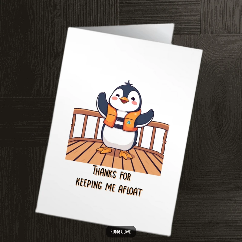 Funny Free Printable Thank You Card: A happy penguin in a life jacket posing triumphantly on a boat deck.